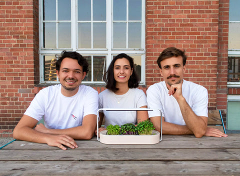 ingarden founders with an ingarden placed in front of them (left to right: Yenal Ersen, Mariana Ferreira, Christian Saitner).